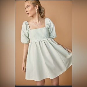 Francesca’s Lilya babydoll dress in mint green size Large